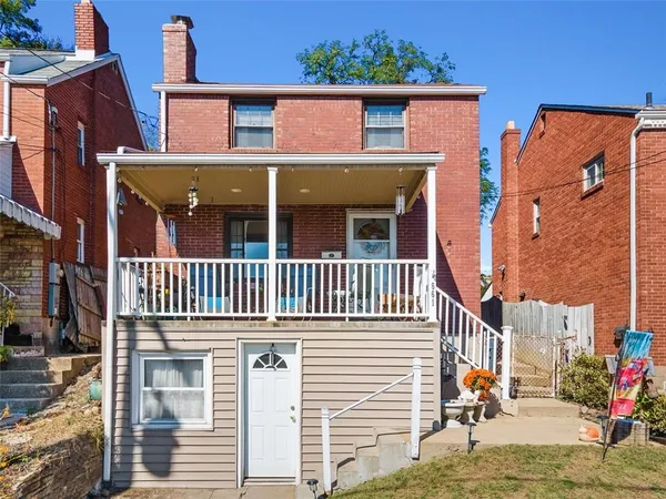 a view of a house with a porch