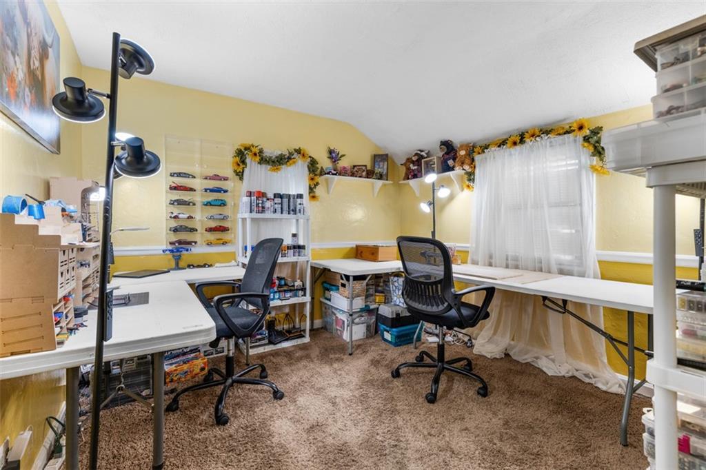 661 Dunster Street Pittsburgh, PA 15226 - Photo 19 of 25 a view of a workspace with furniture and a window
