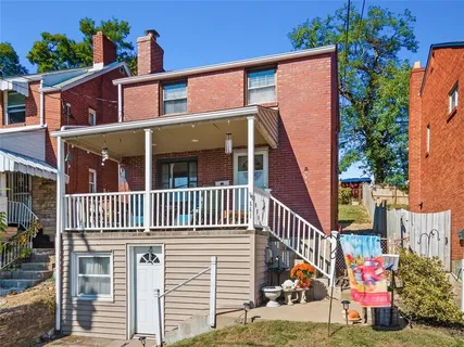 a view of a house with a deck