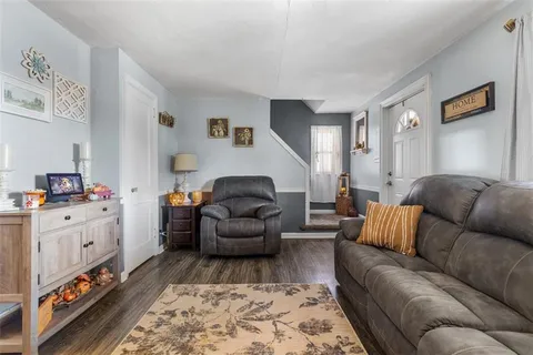 a living room with furniture and a couch