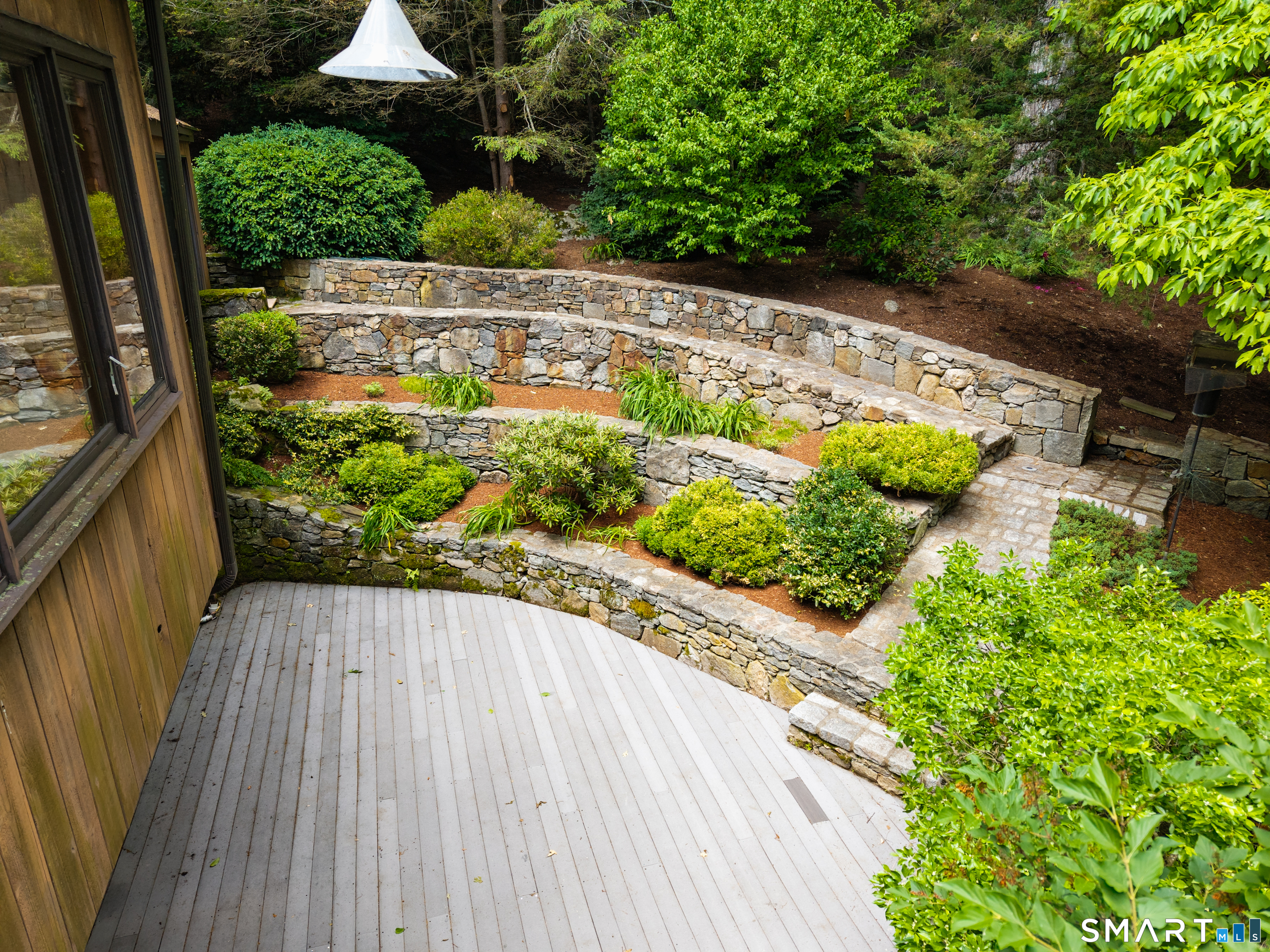 53 Summer Hill Road Madison, CT 06443 - Photo 4 of 29 Multi-level stone terrace and deck