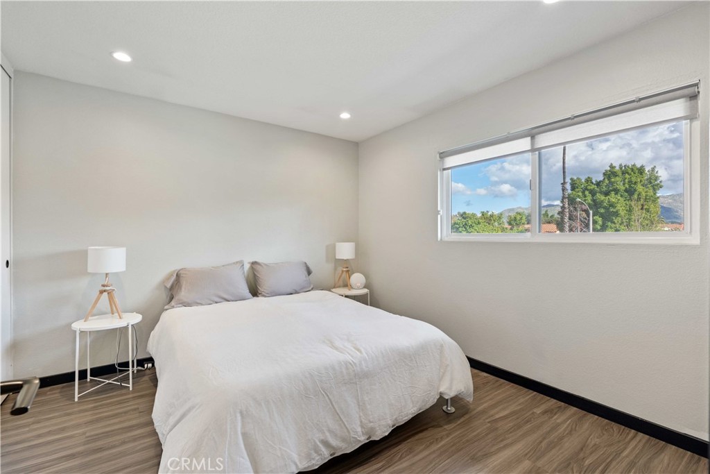 5363 Cornwall Avenue Riverside, CA 92506 - Photo 17 of 23 a bedroom with a bed and a window