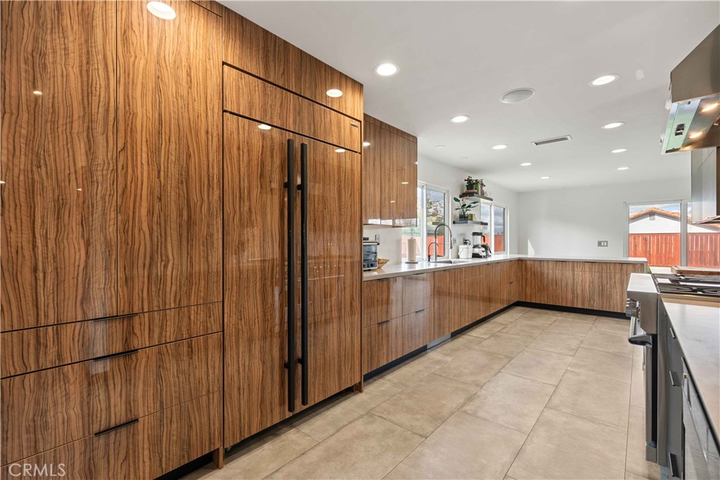 5363 Cornwall Avenue Riverside, CA 92506 - Photo 4 of 23 a view of kitchen with stainless steel appliances kitchen island granite countertop wooden cabinets