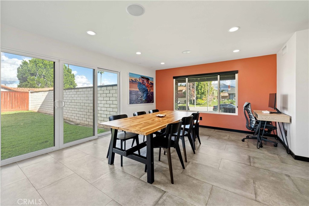 5363 Cornwall Avenue Riverside, CA 92506 - Photo 7 of 23 a dining room with furniture and a floor to ceiling window