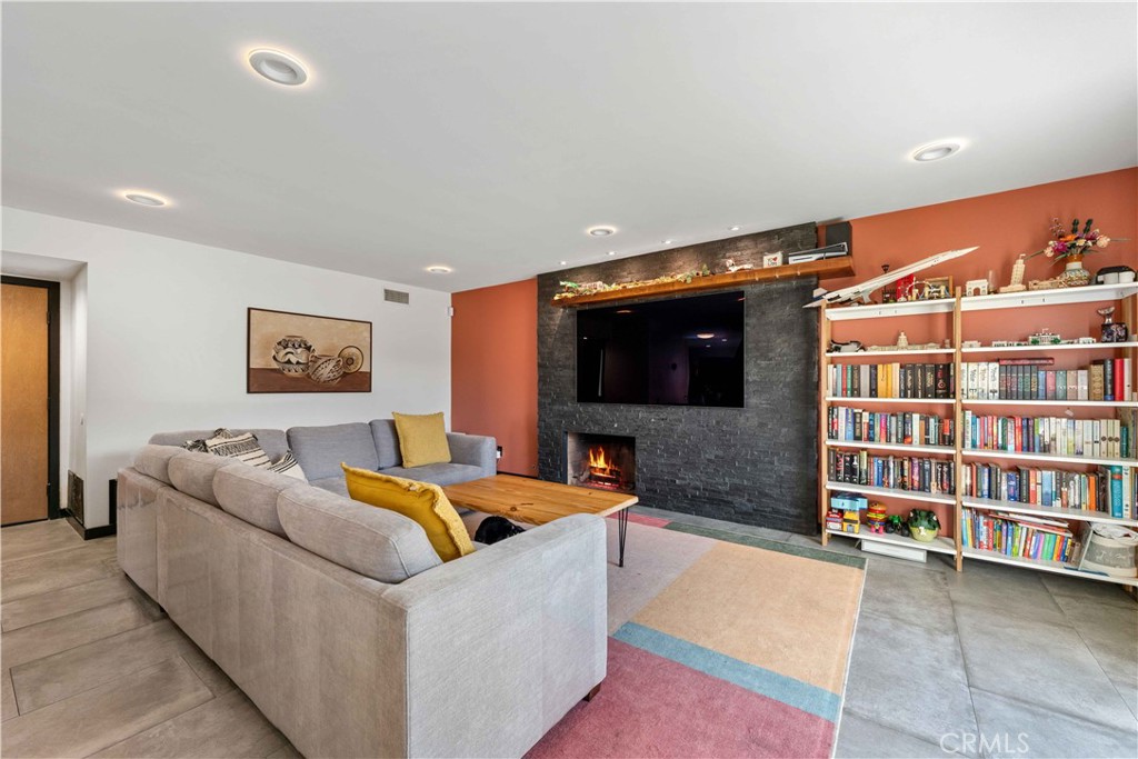 5363 Cornwall Avenue Riverside, CA 92506 - Photo 8 of 23 a living room with furniture and a flat screen tv