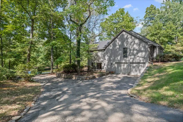 a view of a house with a tree