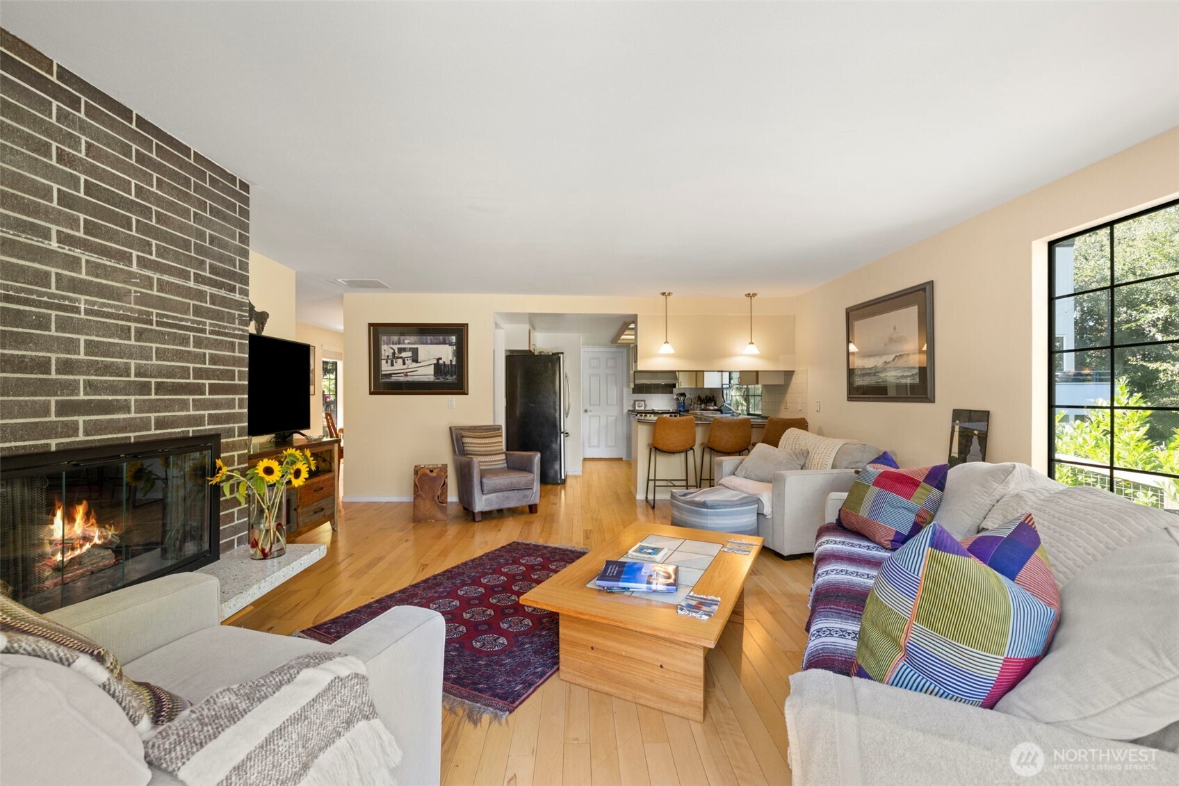 834 Cary Road Edmonds, WA 98020 - Photo 13 of 40 a living room with fireplace furniture and a fireplace