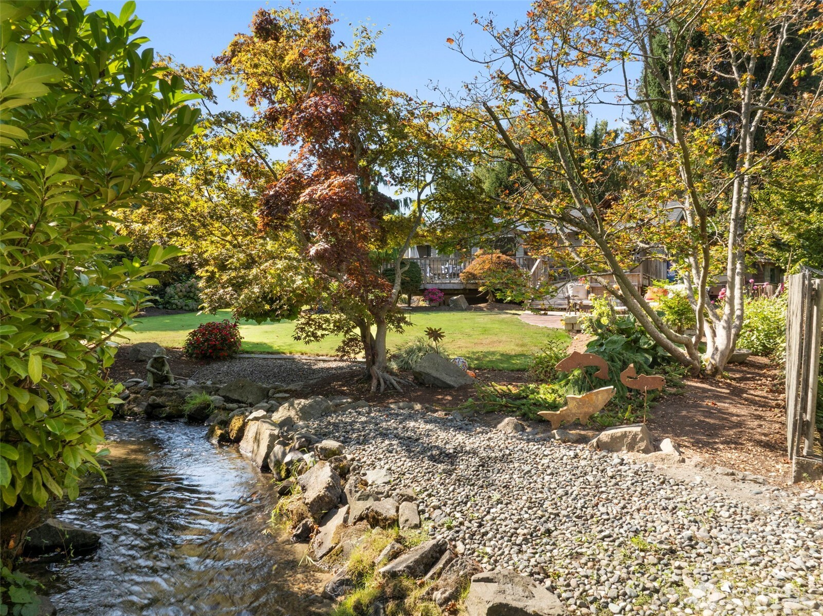 834 Cary Road Edmonds, WA 98020 - Photo 40 of 40 a backyard of a house with a yard and outdoor seating