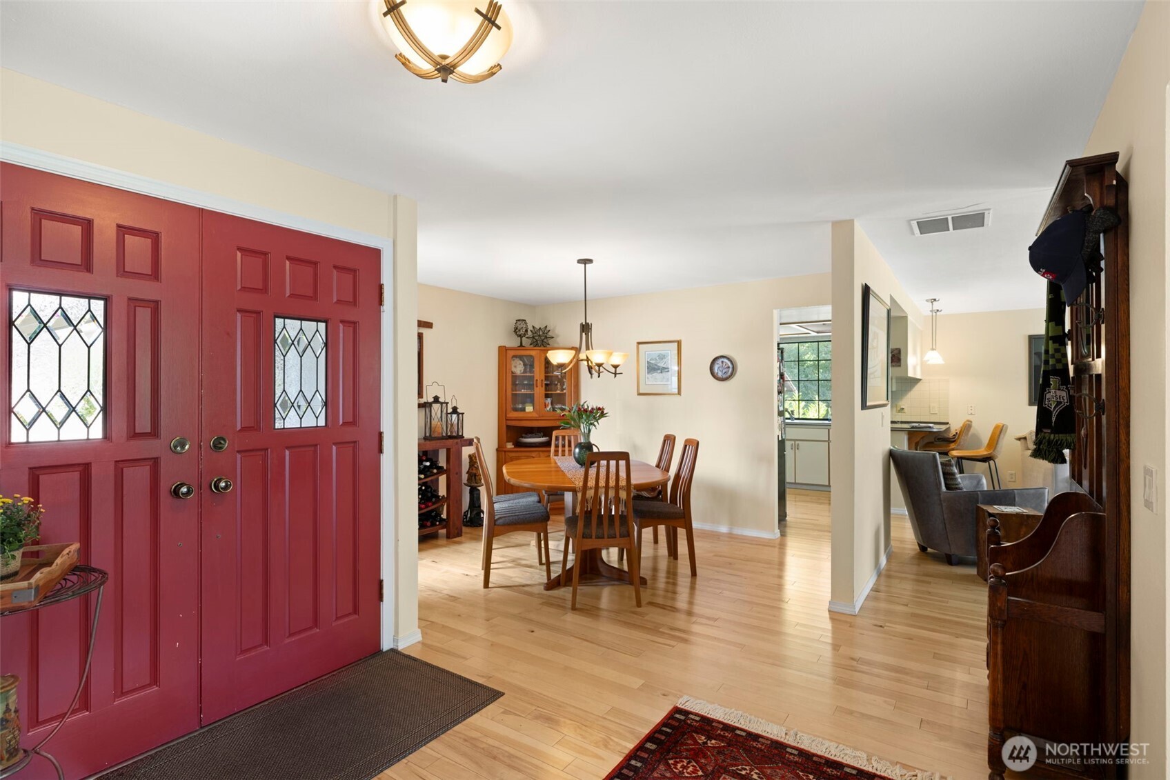 834 Cary Road Edmonds, WA 98020 - Photo 6 of 40 a view of a dining room with furniture window and wooden floor