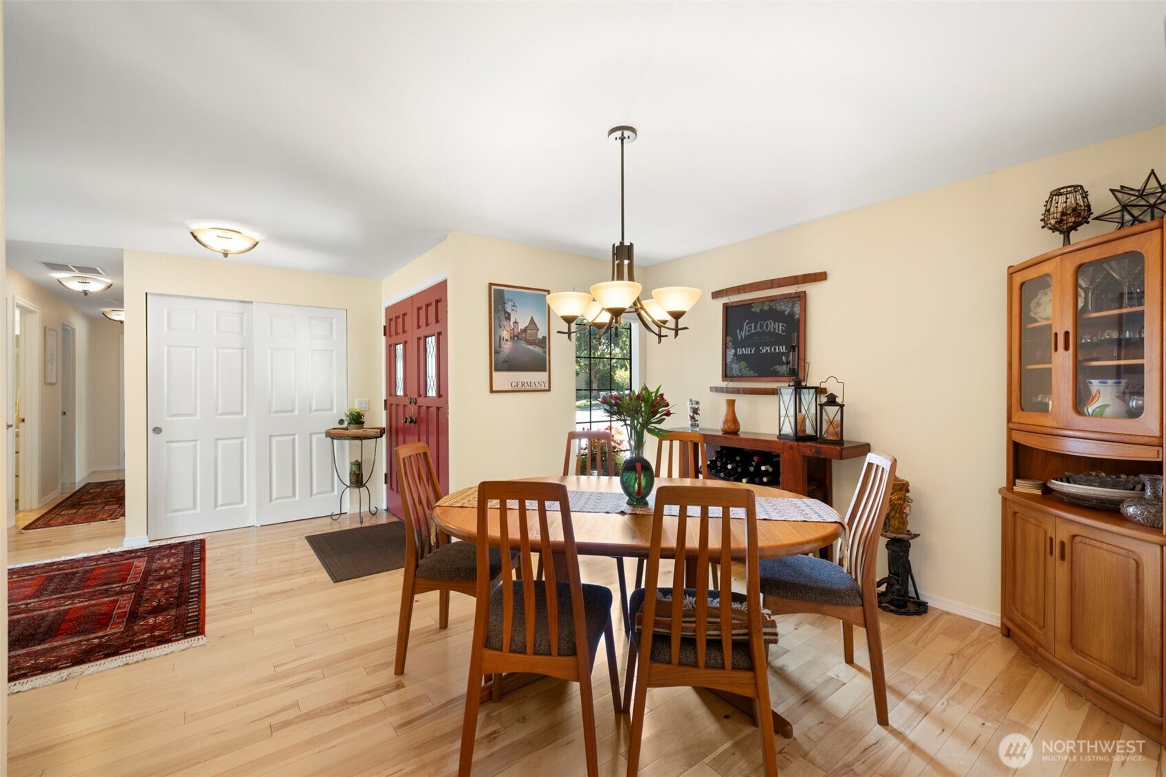 834 Cary Road Edmonds, WA 98020 - Photo 10 of 40 a view of a dining room with furniture window and wooden floor