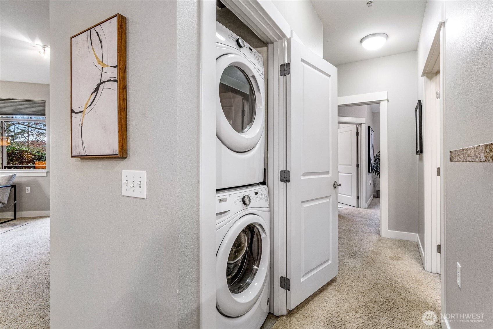 15700 116th Avenue Northeast, Unit 102A Bothell, WA 98011 - Photo 23 of 35 a utility room with dryer and washer