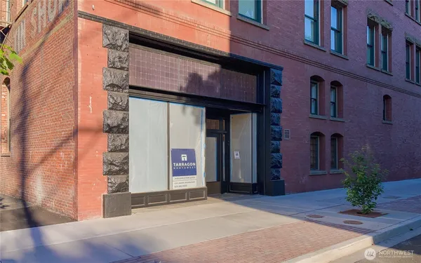 a view of a building with a door and a window