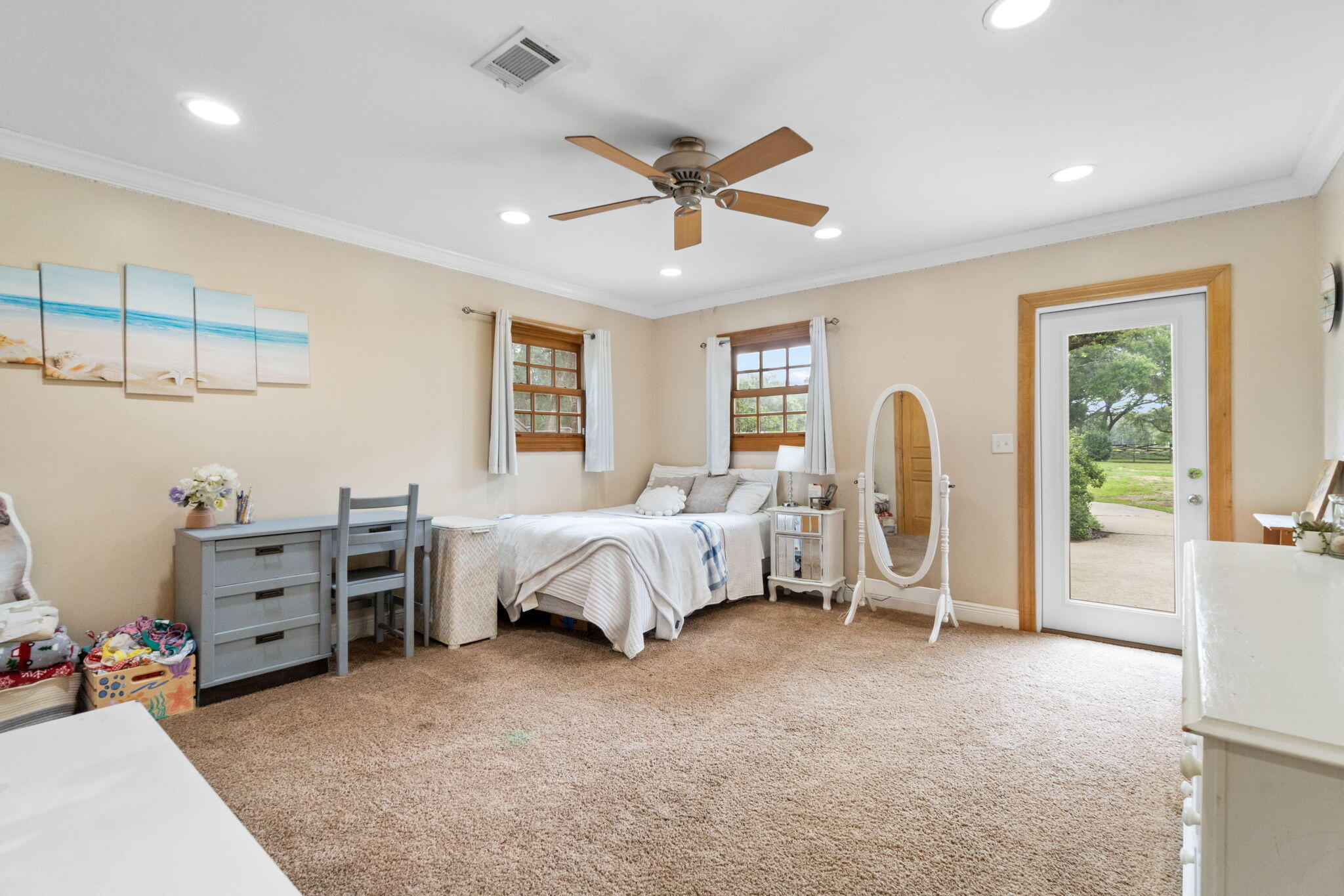5750 Windham Road Milton, FL 32570 - Photo 24 of 77 a bed room with a bed and a chair