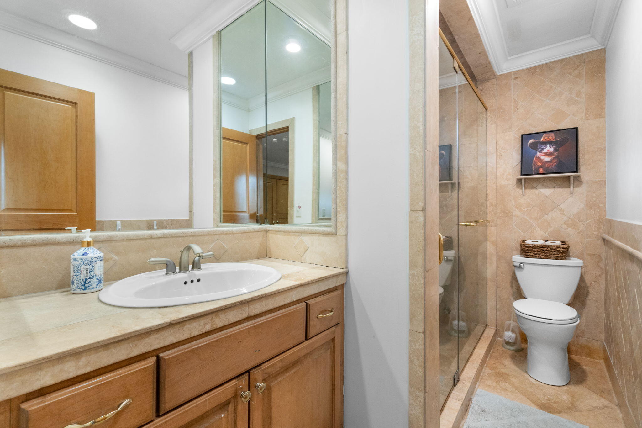 5750 Windham Road Milton, FL 32570 - Photo 26 of 77 a bathroom with a sink a toilet and a mirror