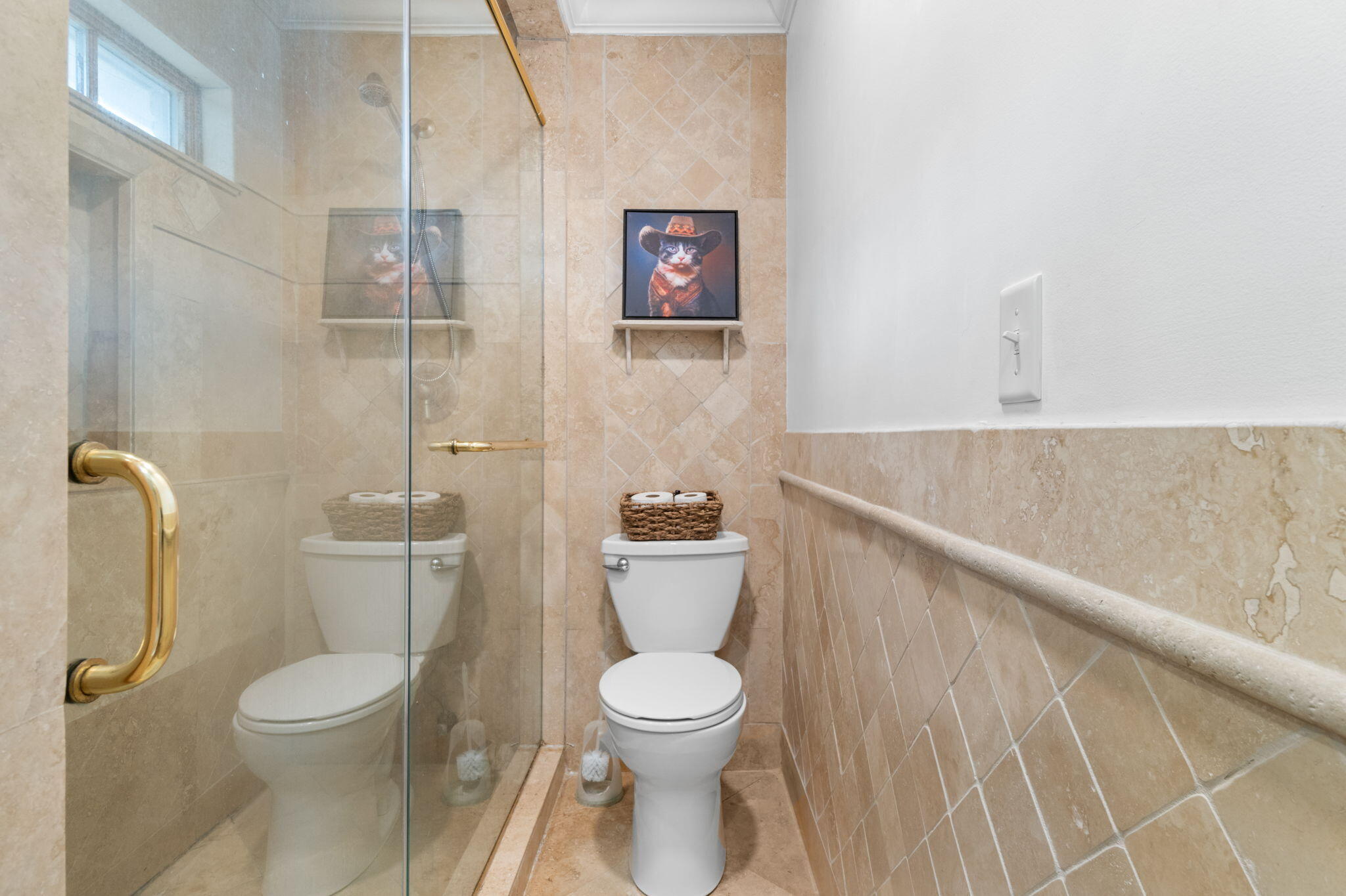 5750 Windham Road Milton, FL 32570 - Photo 27 of 77 a white toilet sitting next to a bathroom sink and a granite counter top a toilet