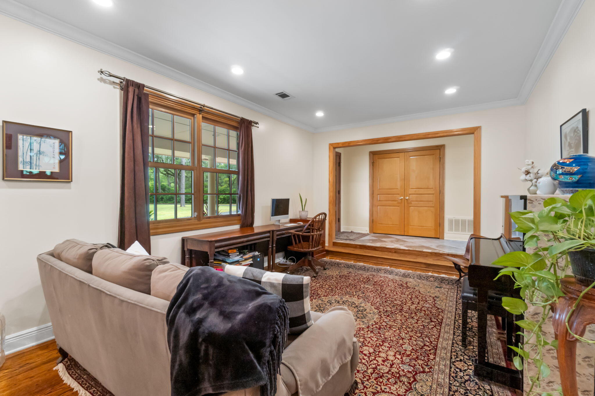 5750 Windham Road Milton, FL 32570 - Photo 35 of 77 a living room with furniture and a potted plant