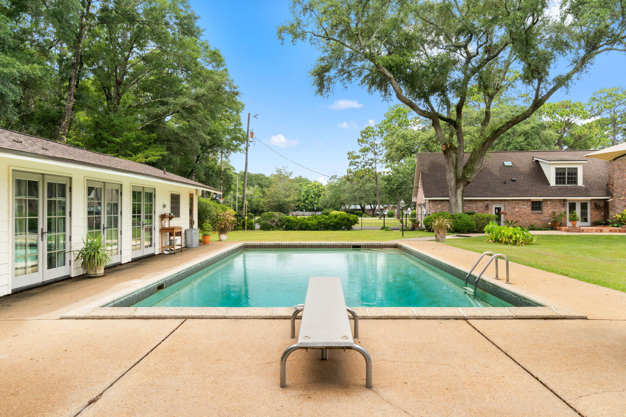 5750 Windham Road Milton, FL 32570 - Photo 55 of 77 a view of swimming pool with chairs