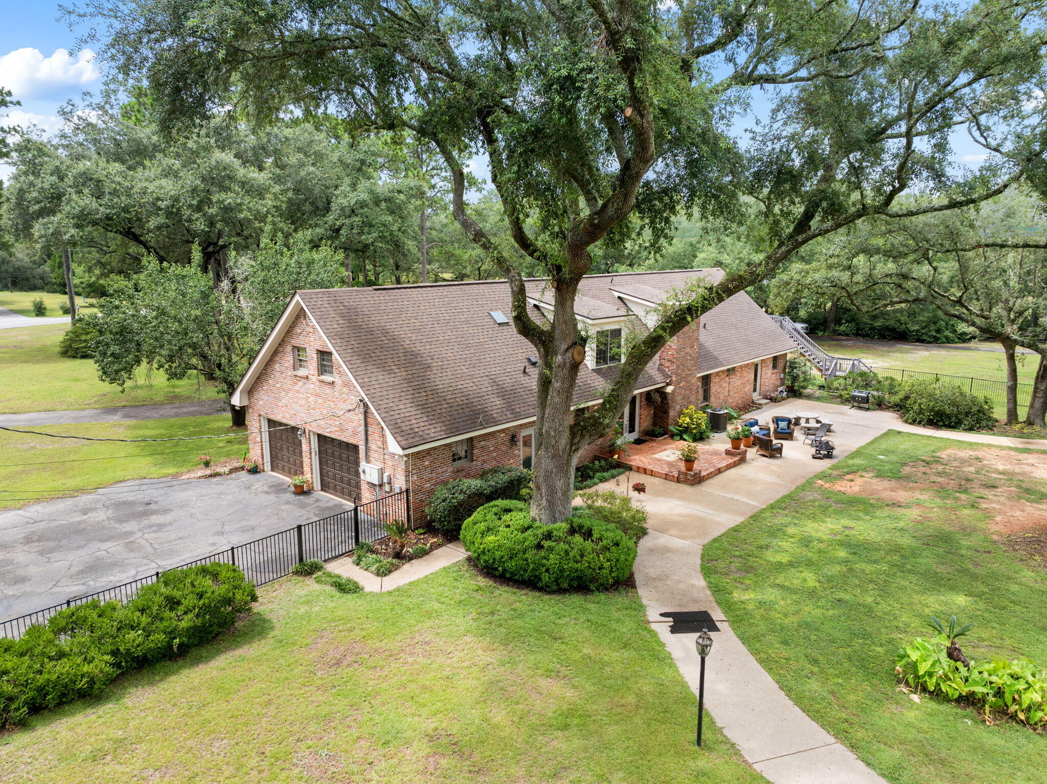5750 Windham Road Milton, FL 32570 - Photo 6 of 77 an aerial view of a house having yard