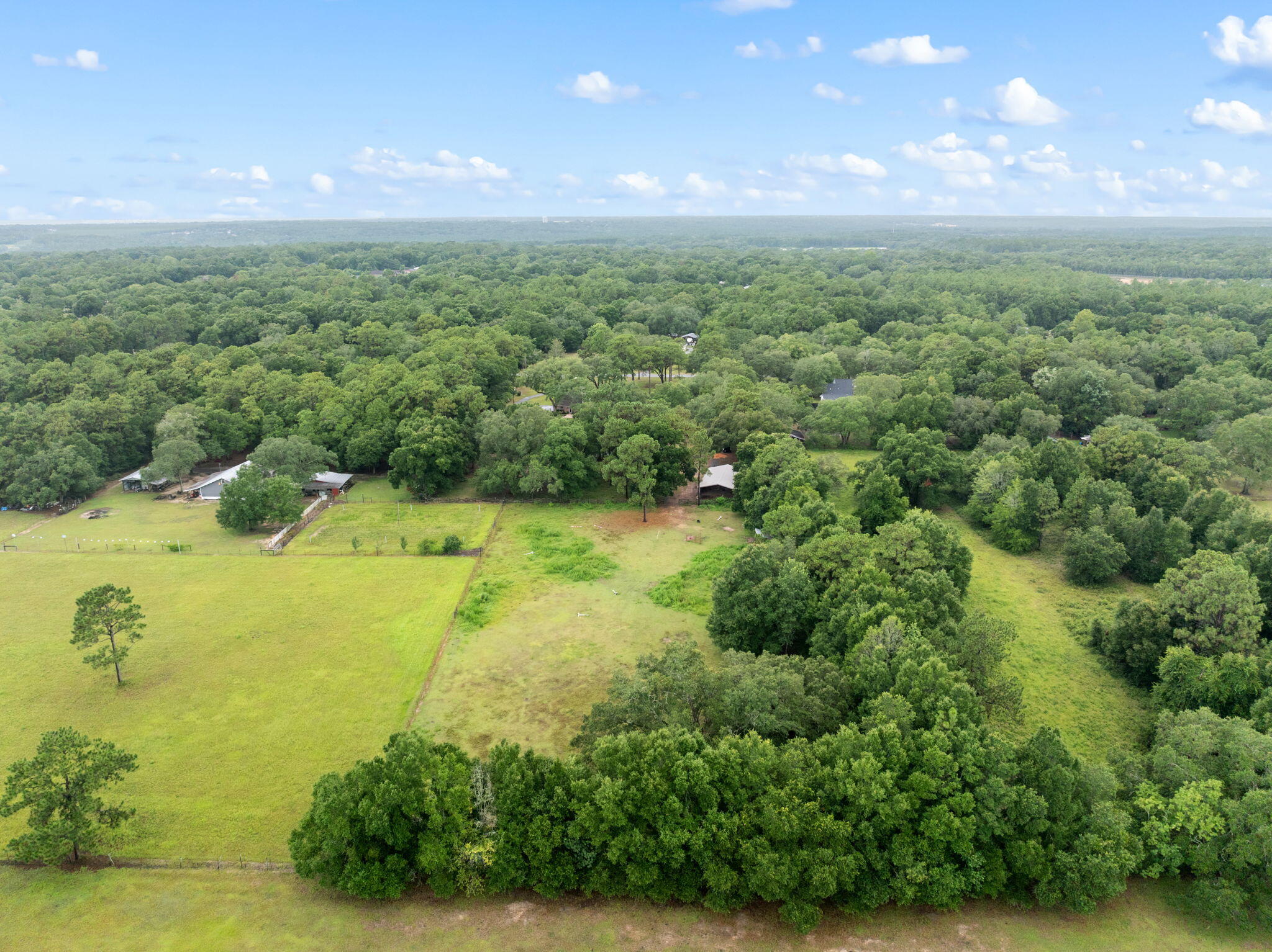 5750 Windham Road Milton, FL 32570 - Photo 74 of 77 a view of a lake with a city