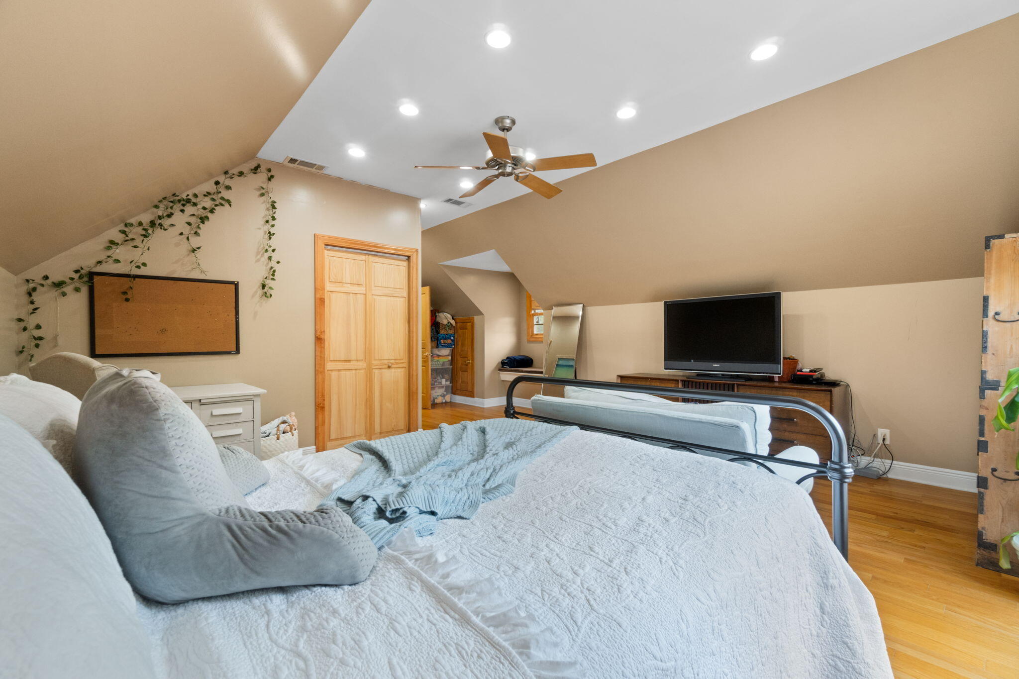 5750 Windham Road Milton, FL 32570 - Photo 10 of 77 a bedroom with a bed and couch