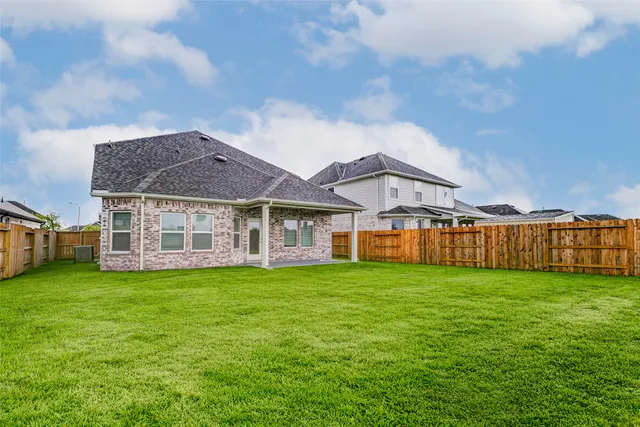 a view of a house with a big yard