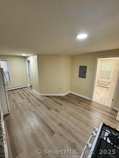 92 West Main Street Vernon, CT 06066 - Photo 12 of 14 a view of empty room with wooden floor