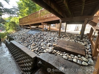 92 West Main Street Vernon, CT 06066 - Photo 14 of 14 a backyard of a house with lots of green space