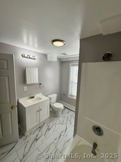 92 West Main Street Vernon, CT 06066 - Photo 3 of 14 a bathroom with a sink a toilet and mirror