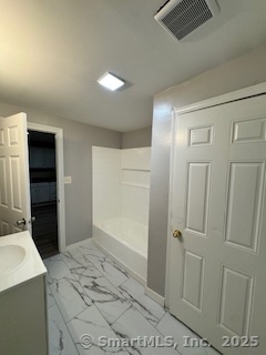 92 West Main Street Vernon, CT 06066 - Photo 10 of 14 a bathroom with a sink and a mirror