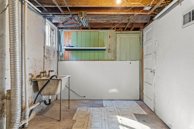 7689 Locust Street Midvale, UT 84047 - Photo 19 of 26 Lower level, Laundry and Storage