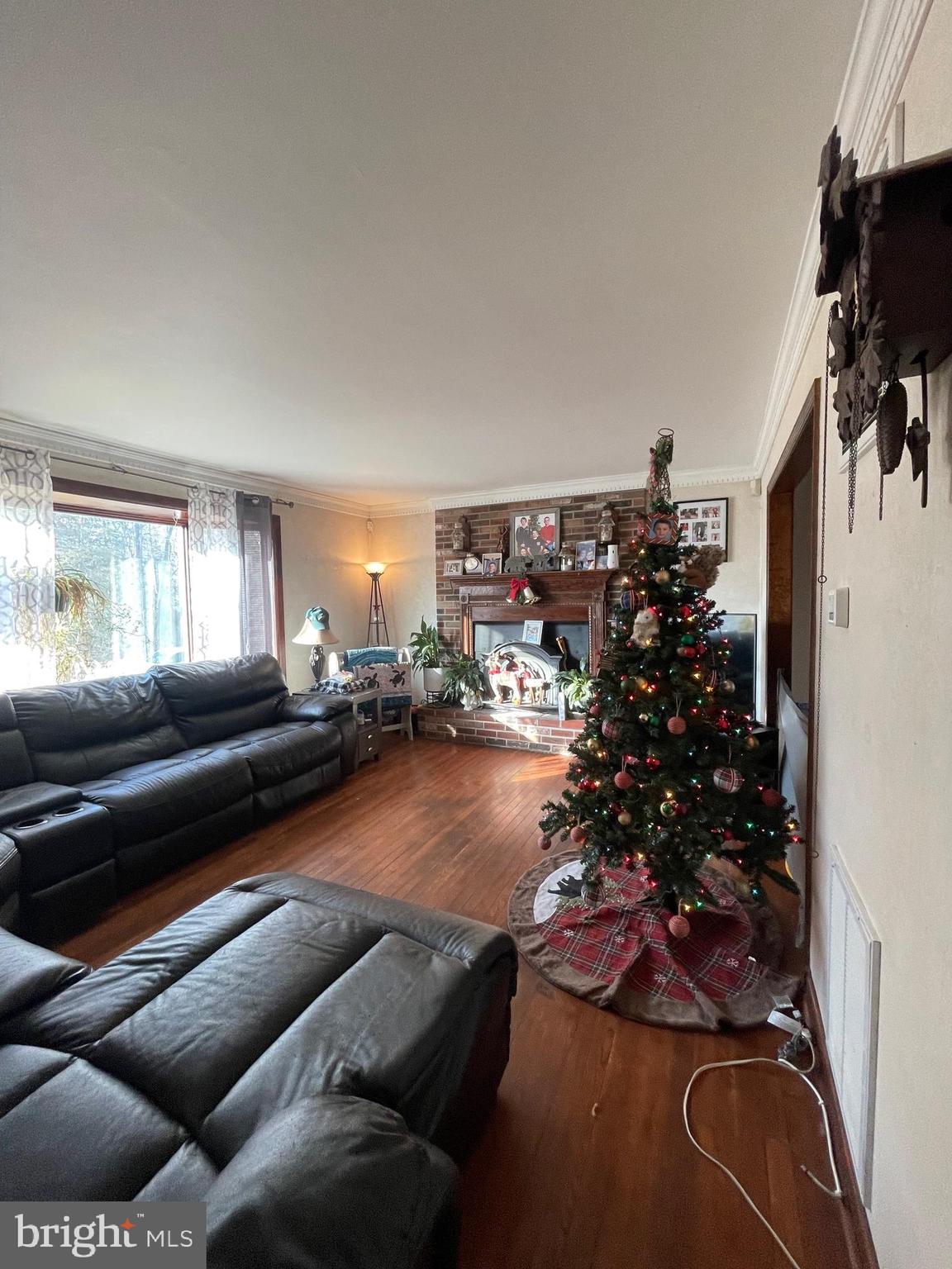 150 North Smith Terrace Clementon, NJ 08021 - Photo 13 of 26 a living room with furniture and a flat screen tv