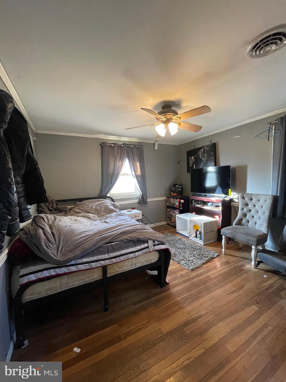 150 North Smith Terrace Clementon, NJ 08021 - Photo 16 of 26 a living room with furniture and a chandelier