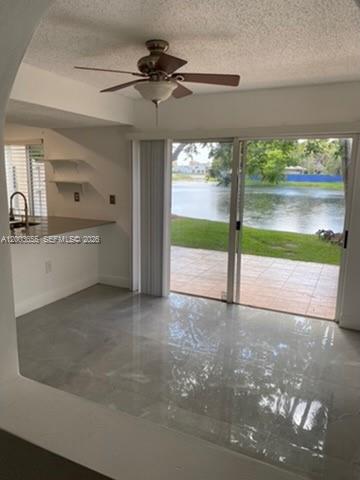 203 Riviera Circle, Unit 203 Weston, FL 33326 - Photo 11 of 30 a view of a big room with a fireplace and a garage