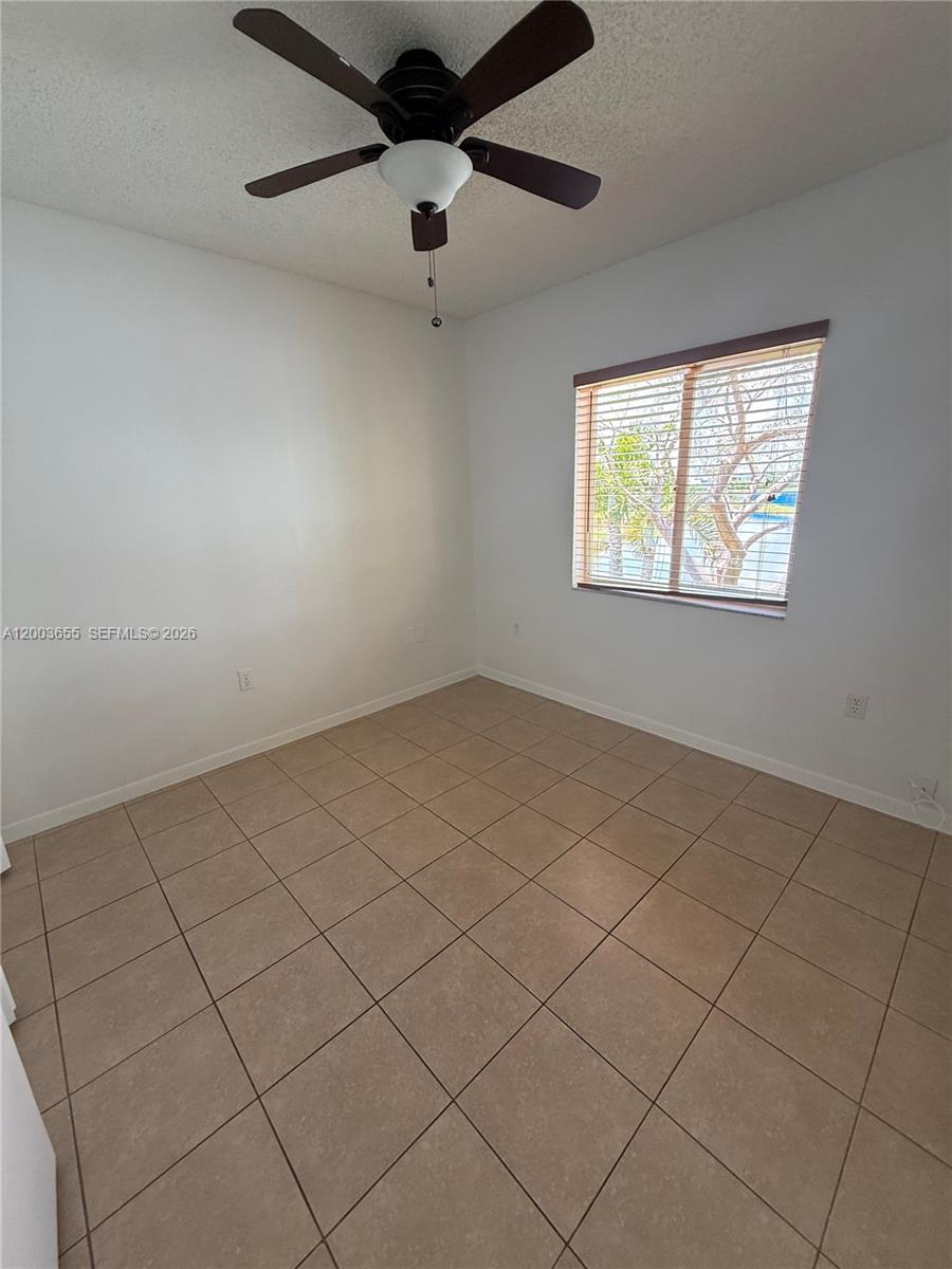 203 Riviera Circle, Unit 203 Weston, FL 33326 - Photo 23 of 30 an empty room with windows