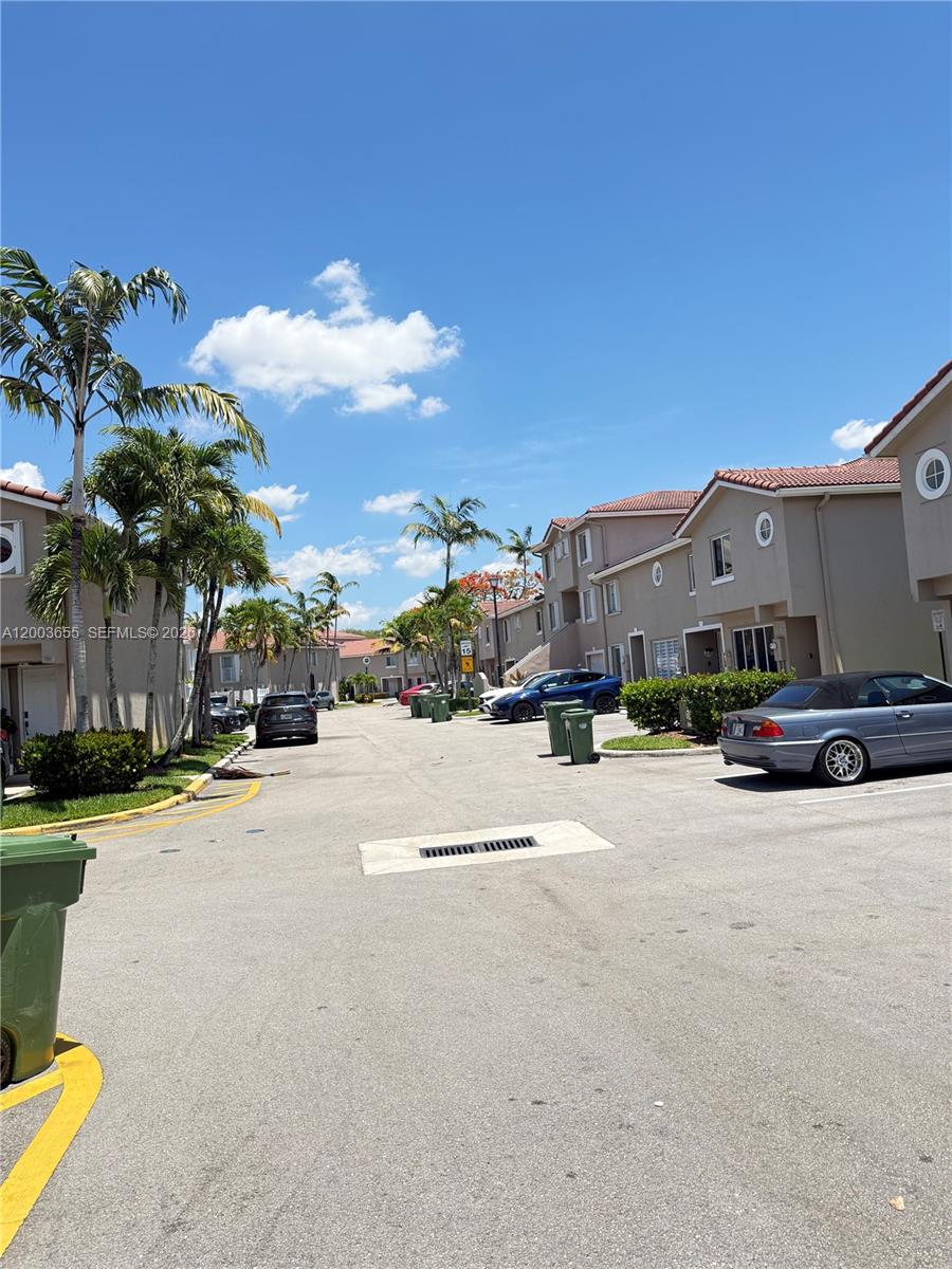 203 Riviera Circle, Unit 203 Weston, FL 33326 - Photo 30 of 30 a view of a street with cars