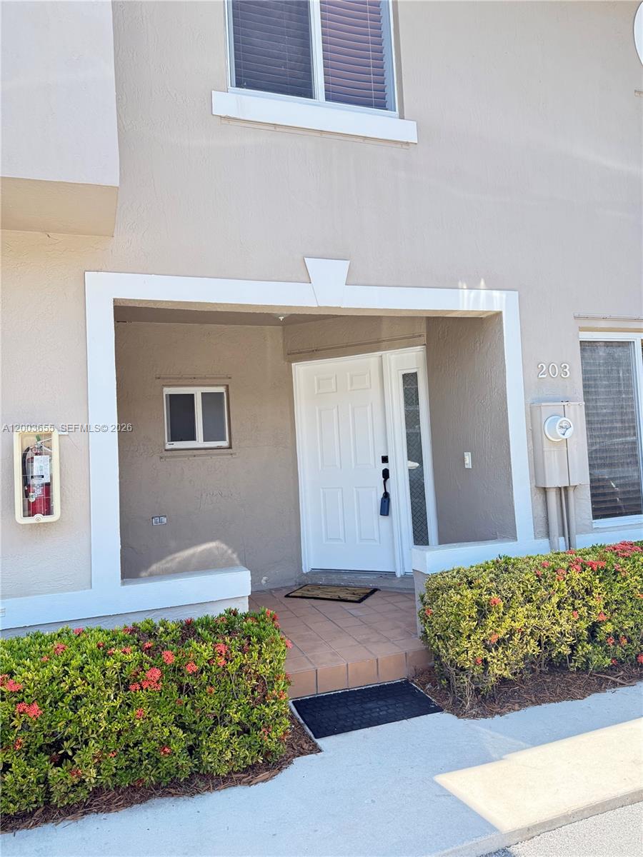 203 Riviera Circle, Unit 203 Weston, FL 33326 - Photo 4 of 30 a front view of a house