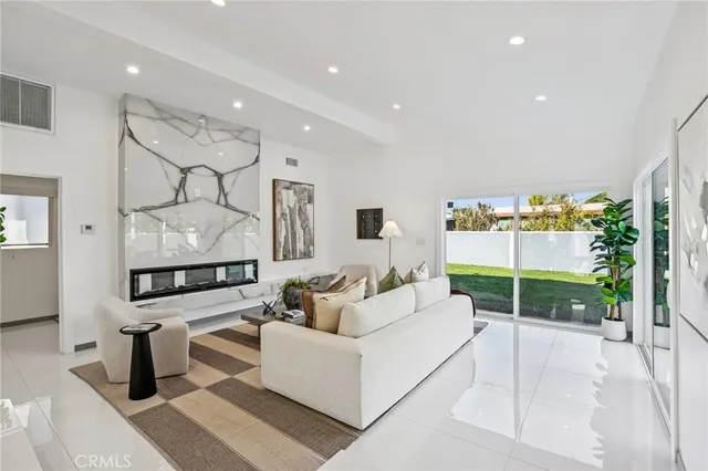 a living room with furniture and a gate