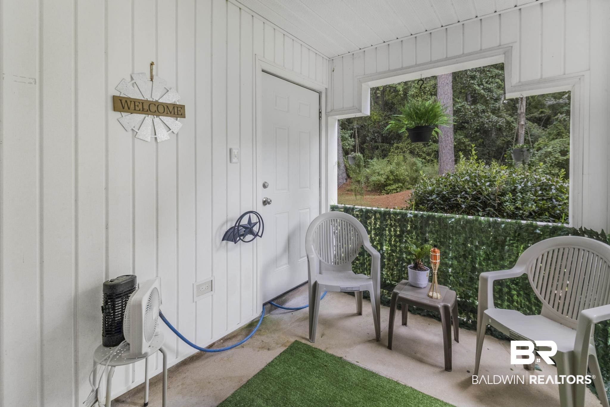 110 5th Street, Unit A 103 Daphne, AL 36526 - Photo 25 of 28 Sunroom / solarium featuring a healthy amount of sunlight