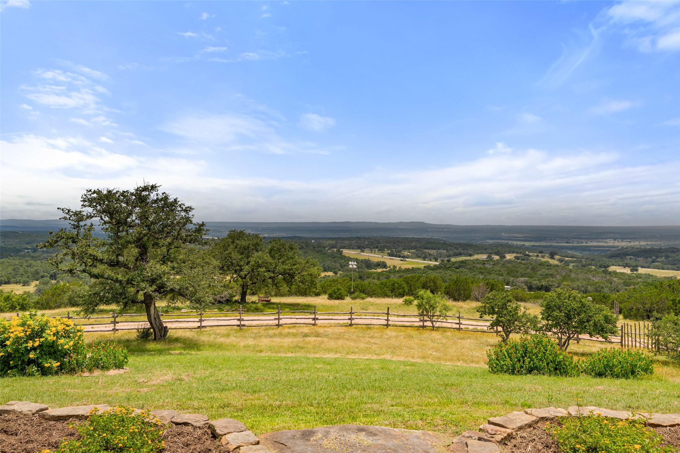 8400 Ranch Road 1431 Marble Falls, TX 78654 - Photo 4 of 30 Panoramic views sweep across the valley, showcasing natural beauty and expansive skies.