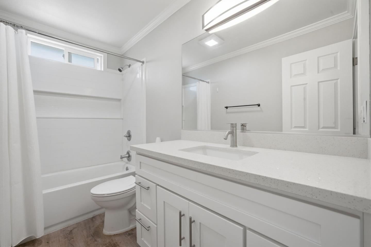 10867 Assisi Way Salinas, CA 93907 - Photo 11 of 35 a bathroom with a sink a toilet and shower