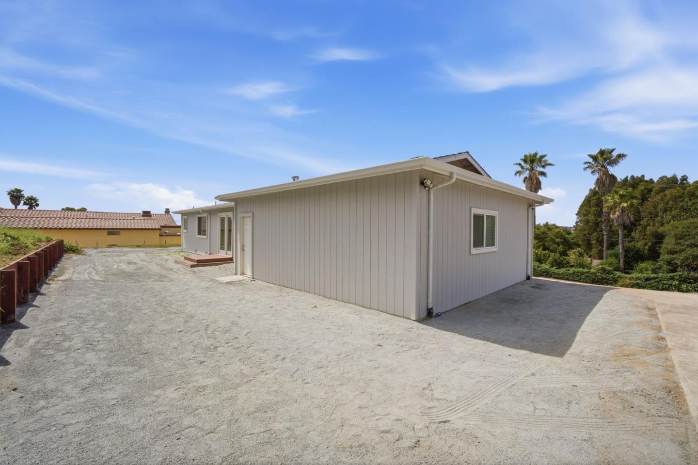 10867 Assisi Way Salinas, CA 93907 - Photo 23 of 35 a view of a house with a backyard