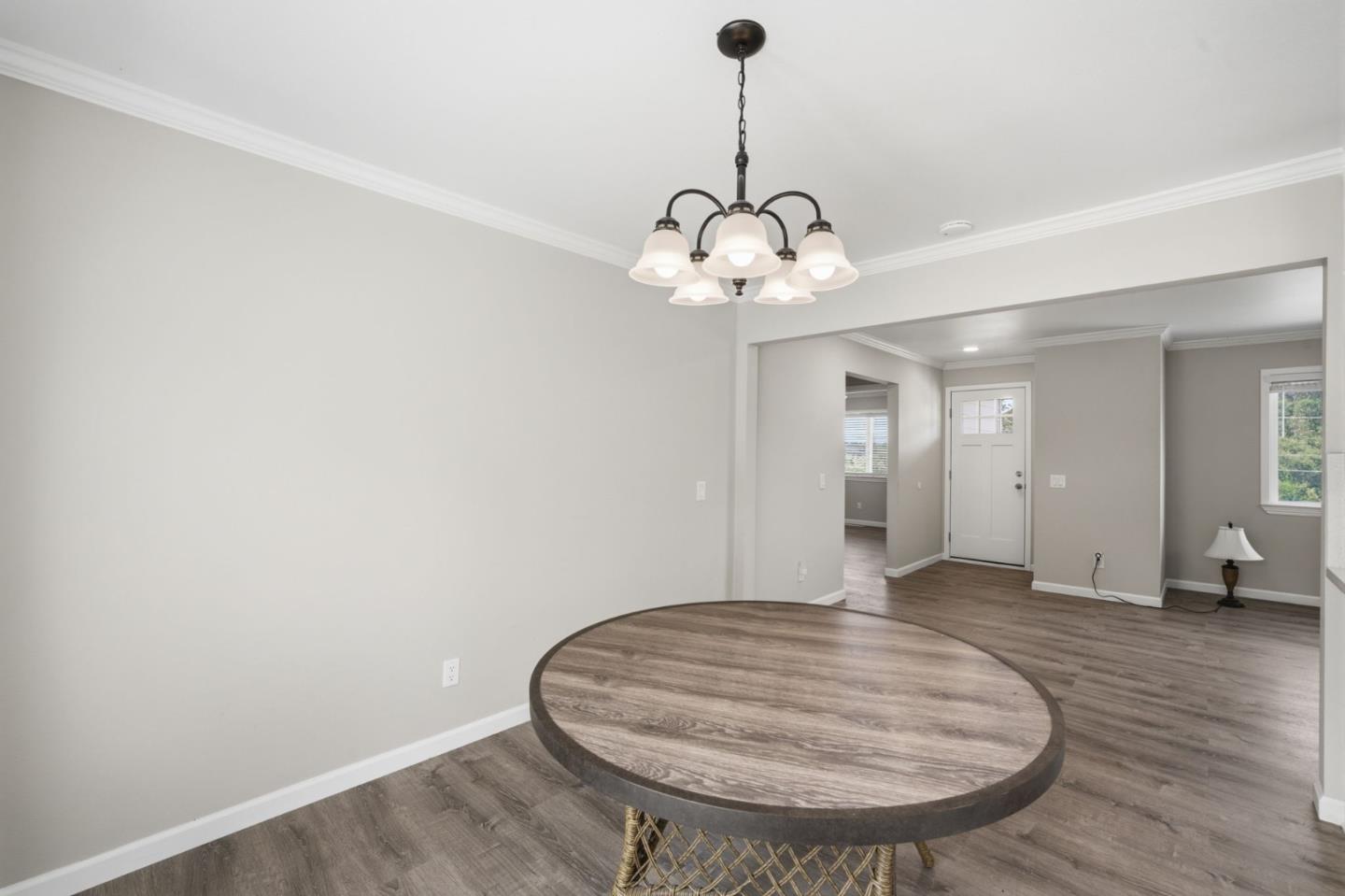 10867 Assisi Way Salinas, CA 93907 - Photo 31 of 35 a view of a livingroom with a chandelier