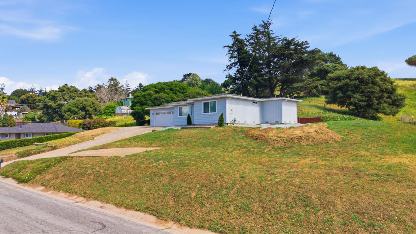 10867 Assisi Way Salinas, CA 93907 - Photo 4 of 35 a view of a house with a yard