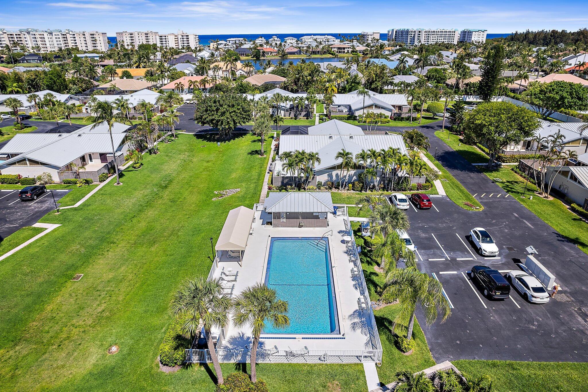 1801 South Us Highway, Unit 8D Jupiter, FL 33477 - Photo 24 of 36 an aerial view of residential houses with outdoor space