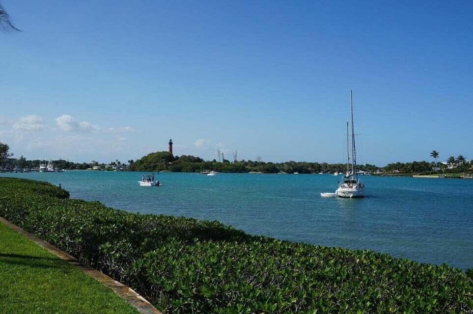 1801 South Us Highway, Unit 8D Jupiter, FL 33477 - Photo 36 of 36 a view of a lake and outdoor space