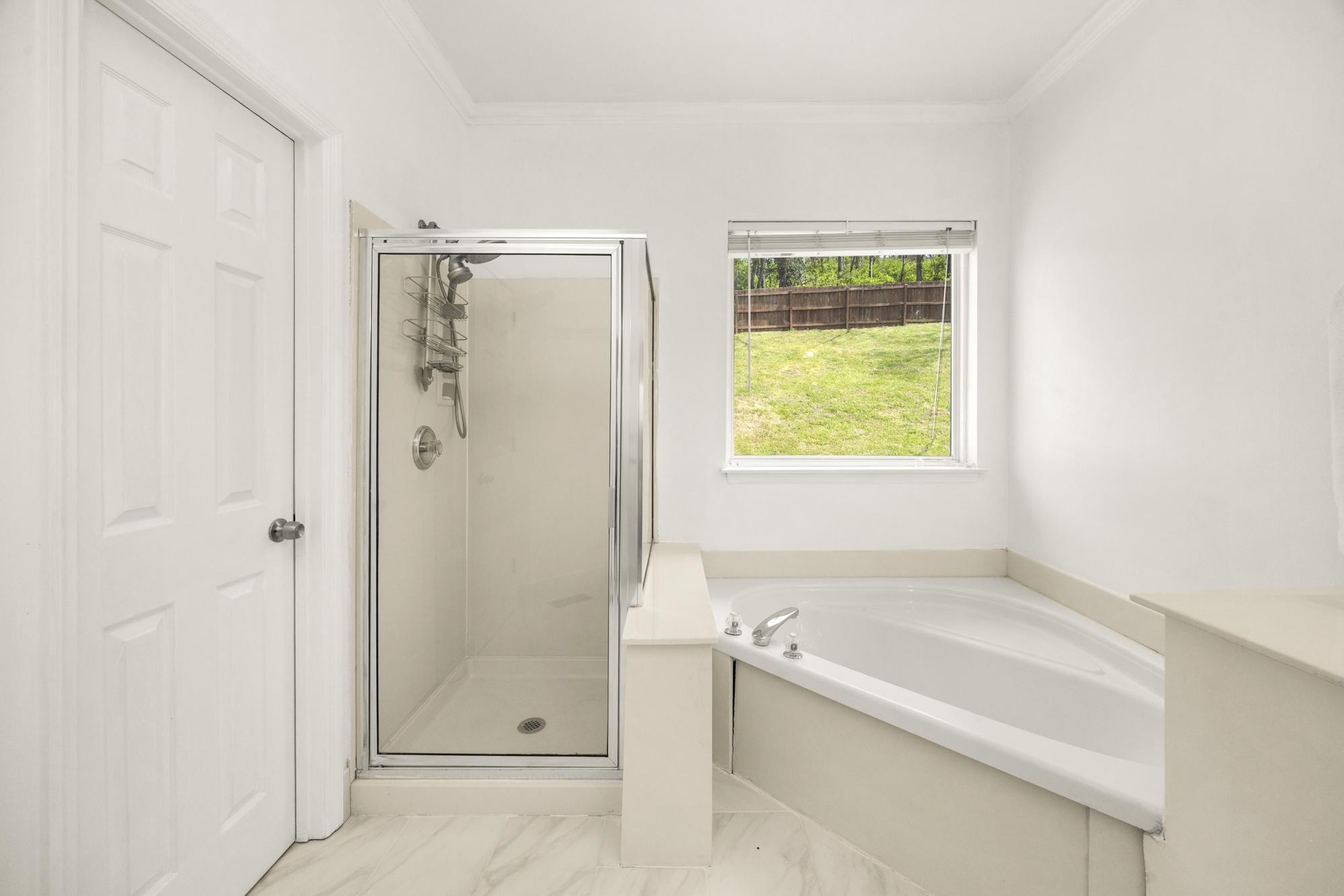 513 Cold Stream Place Nashville, TN 37221 - Photo 18 of 40 a bathroom with a bathtub and shower