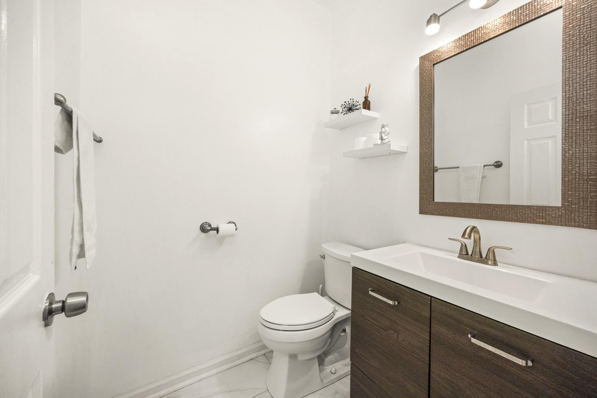 513 Cold Stream Place Nashville, TN 37221 - Photo 26 of 40 a bathroom with a sink a toilet and shower