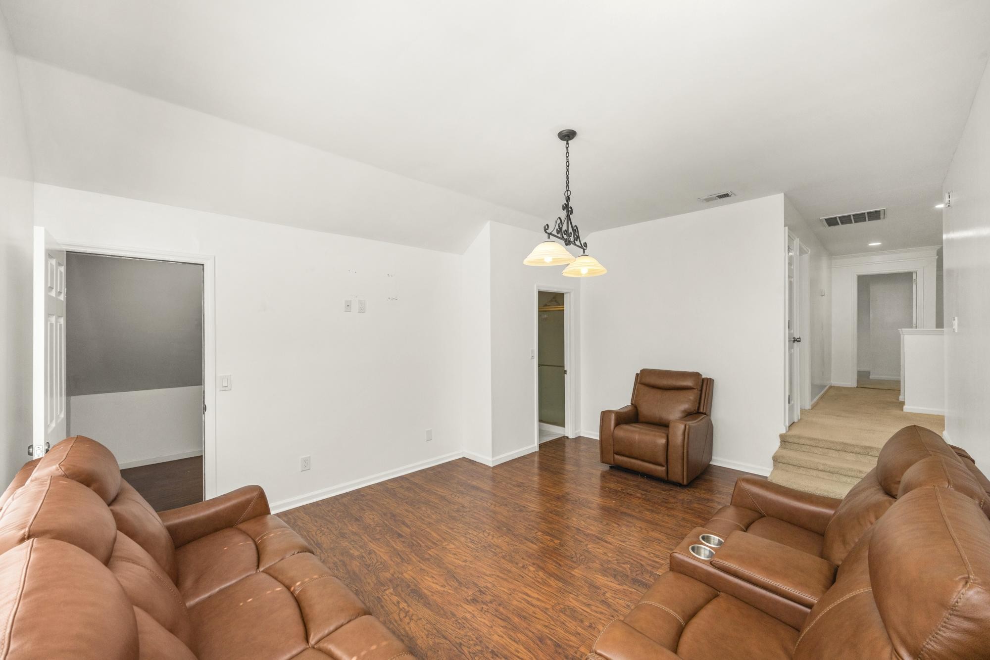 513 Cold Stream Place Nashville, TN 37221 - Photo 27 of 40 a view of a livingroom with furniture and a chandelier