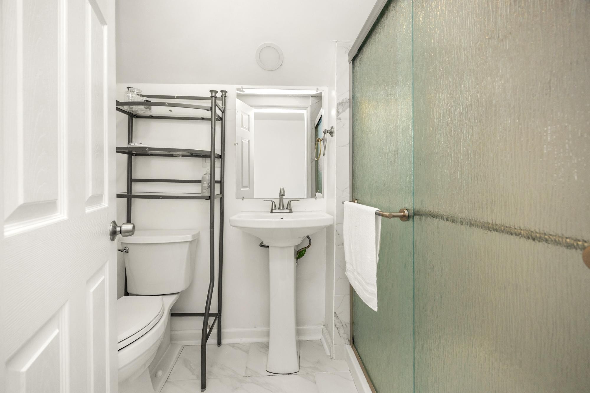 513 Cold Stream Place Nashville, TN 37221 - Photo 30 of 40 a bathroom with a sink a toilet and shower