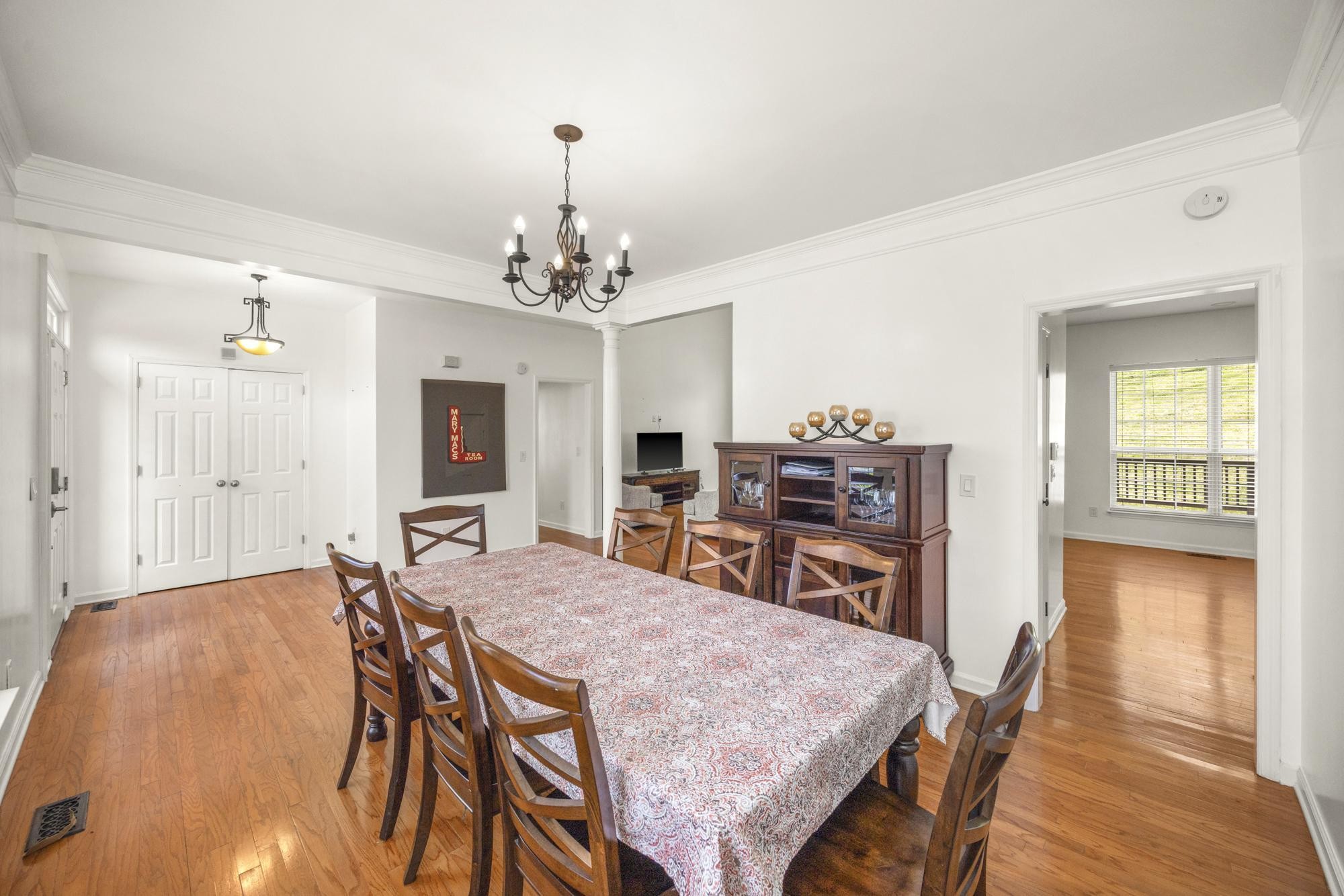 513 Cold Stream Place Nashville, TN 37221 - Photo 4 of 40 a view of a dining room with furniture and wooden floor